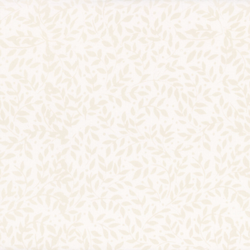 Oyster white fabric with light cream packed leaves.