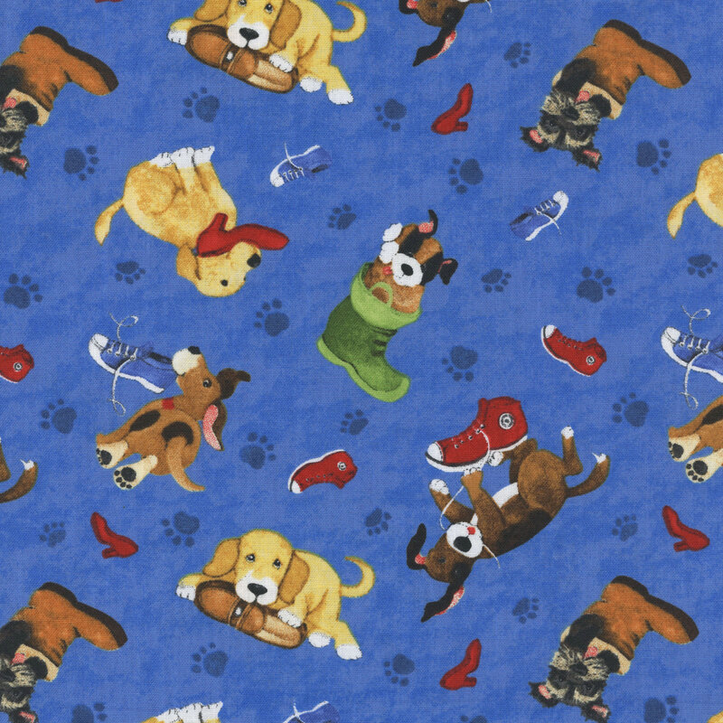 Mottled blue fabric with a playful pattern of cartoon dogs interacting with footwear, with pawprints scattered in the background.
