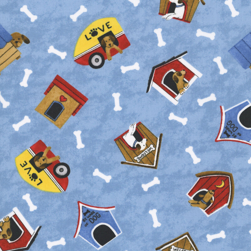 Mottled blue fabric with a tossed pattern of dog houses and bones.