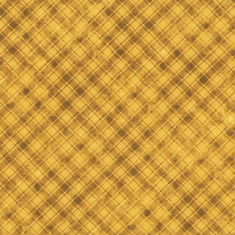 yellow fabric features a weathered plaid pattern.