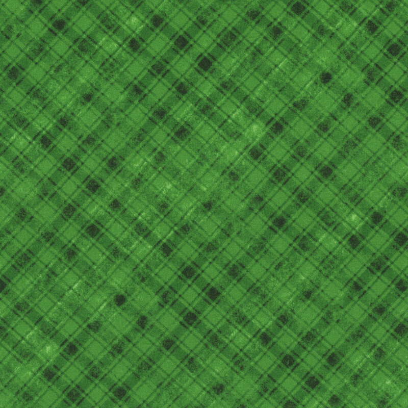 Green fabric features a weathered plaid pattern.