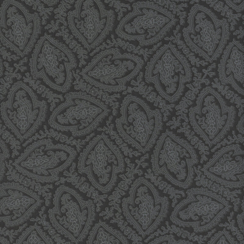 A tonal black fabric packed with paisleys and floral accents. 