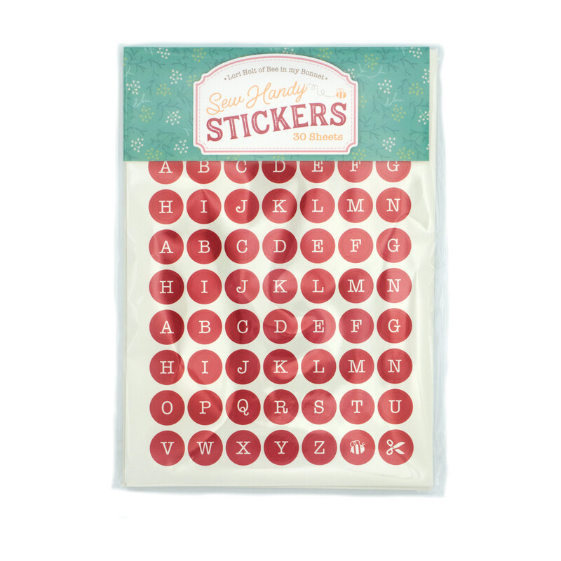 Sheet of red alphabet stickers in circular shapes in packaging, titled Sew Handy Stickers2.