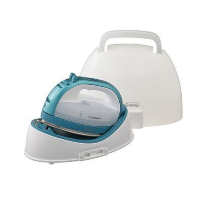 A teal and white steam iron resting in its white storage case.