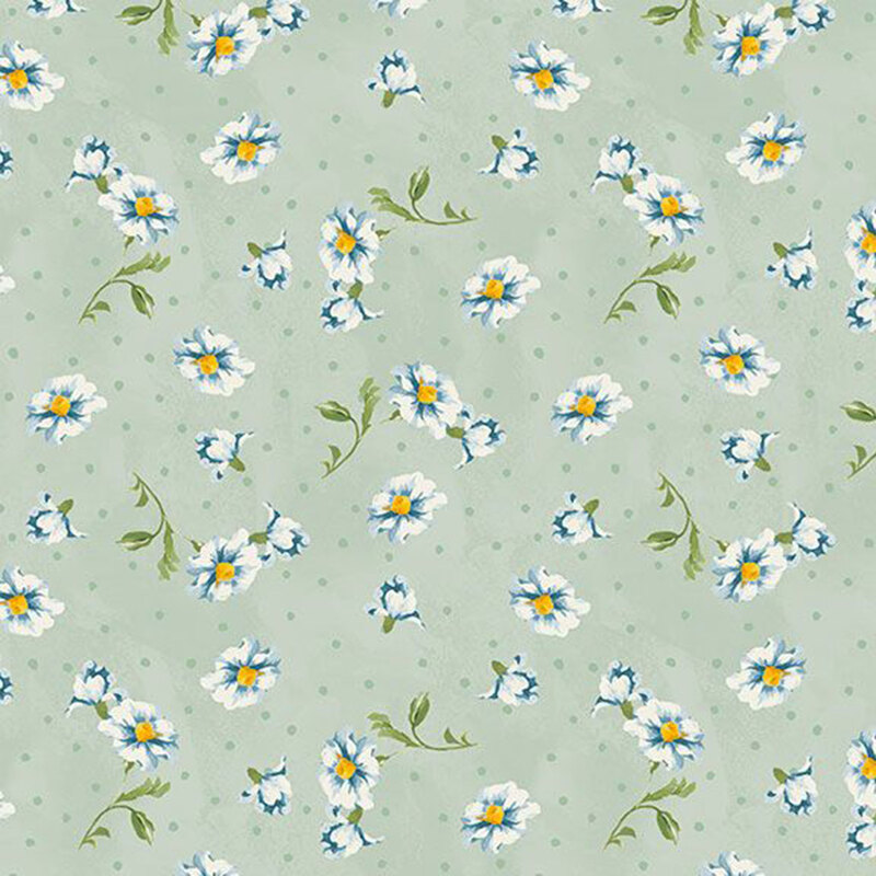 Subtly mottled pistachio green fabric featuring sage polka dots and tossed white and blue flowers