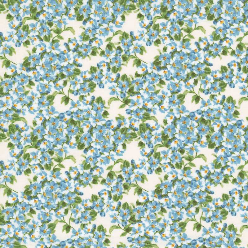 Cream fabric with a dense blue floral pattern