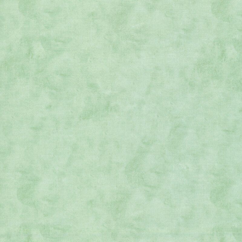 Pistachio green fabric with subtle mottling and a brush stroke texture