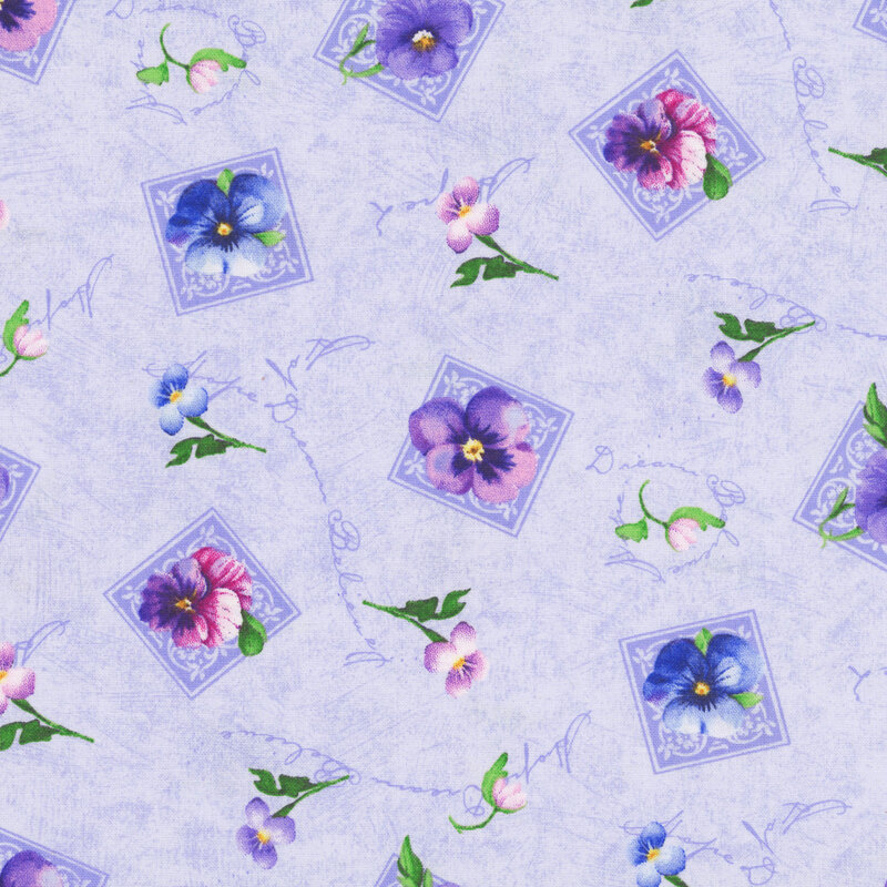 textured iris blue fabric features an all-over pattern of florals and stamp motifs with subtle cursive text in the background.