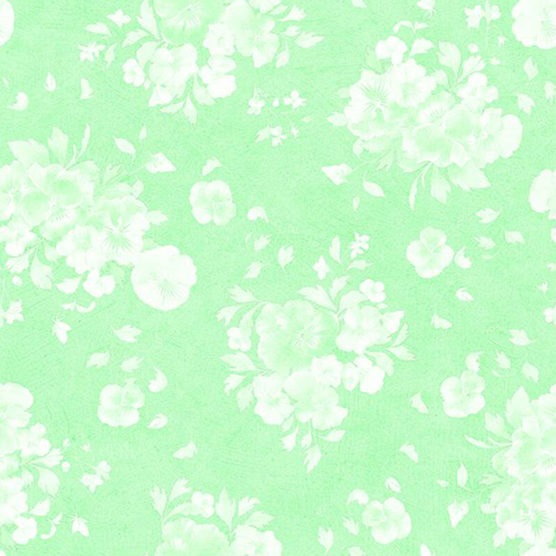 Mottled bright green fabric with a subtle pattern of white florals and leaves.