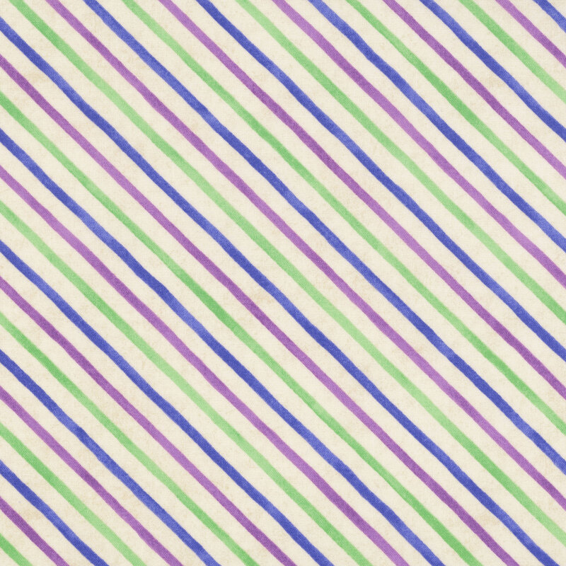 Cream fabric with diagonal stripes with blended green and purple variations.
