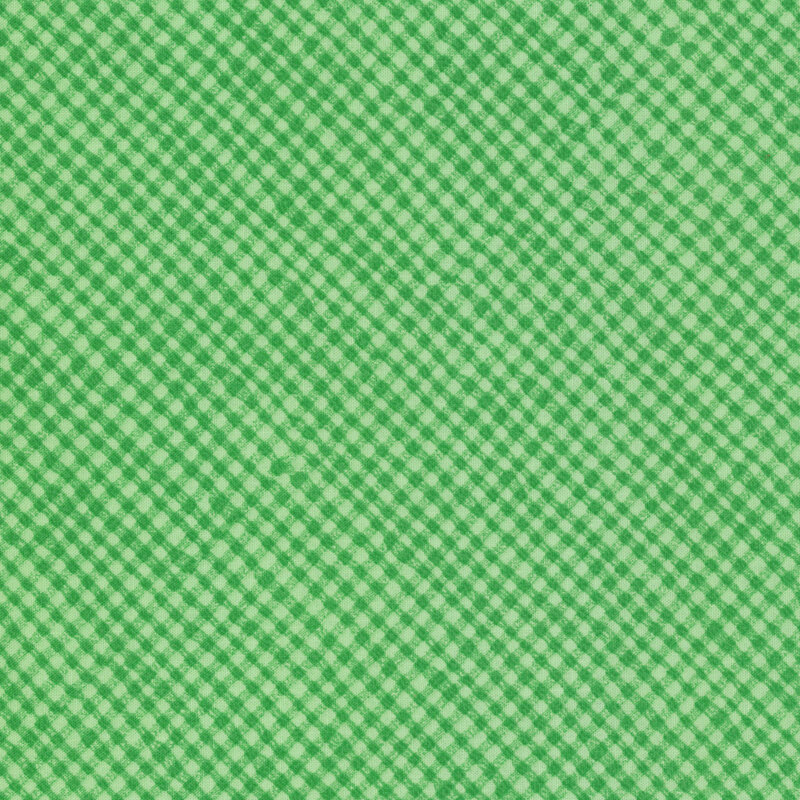 Green fabric with an irregular tonal gingham pattern with subtle variations in scale and texture.