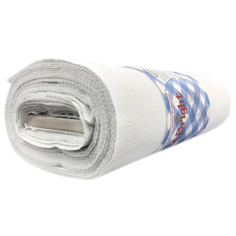 A roll of white polyester interfacing with a blue and white patterned label.