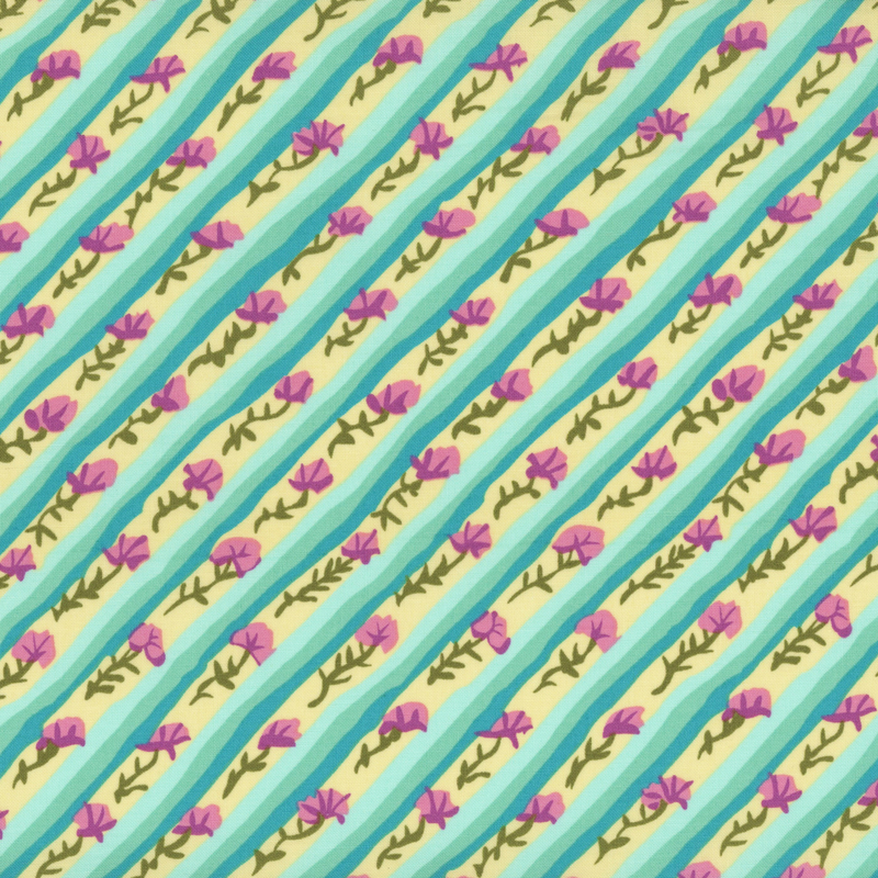 Chiffon yellow fabric featuring diagonal stripes in shades of teal and purple flowers.