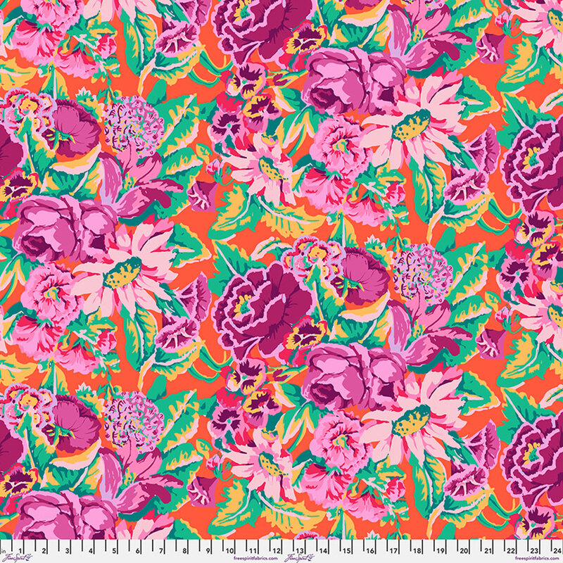 Bright orange fabric featuring large pink and purple flowers.