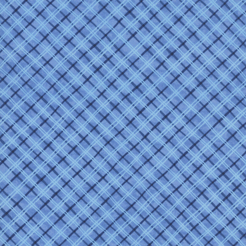 Mottled blue fabric with a timeless plaid pattern with subtle variation.