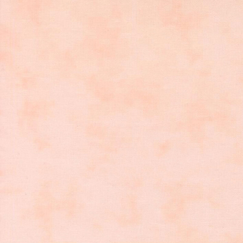 Mottled linen textured fabric in light blush pink