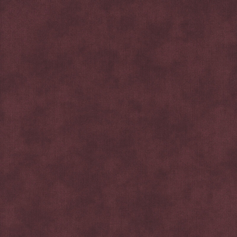 Mottled linen textured fabric in deep wine red