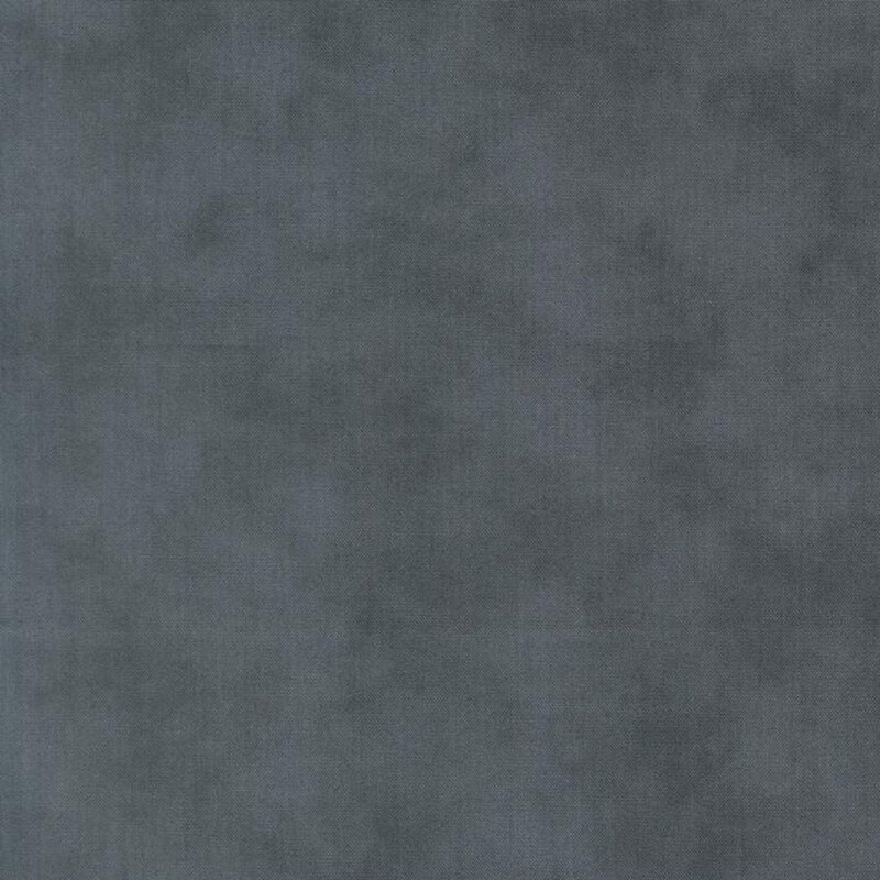 Mottled linen textured fabric in muted navy blue