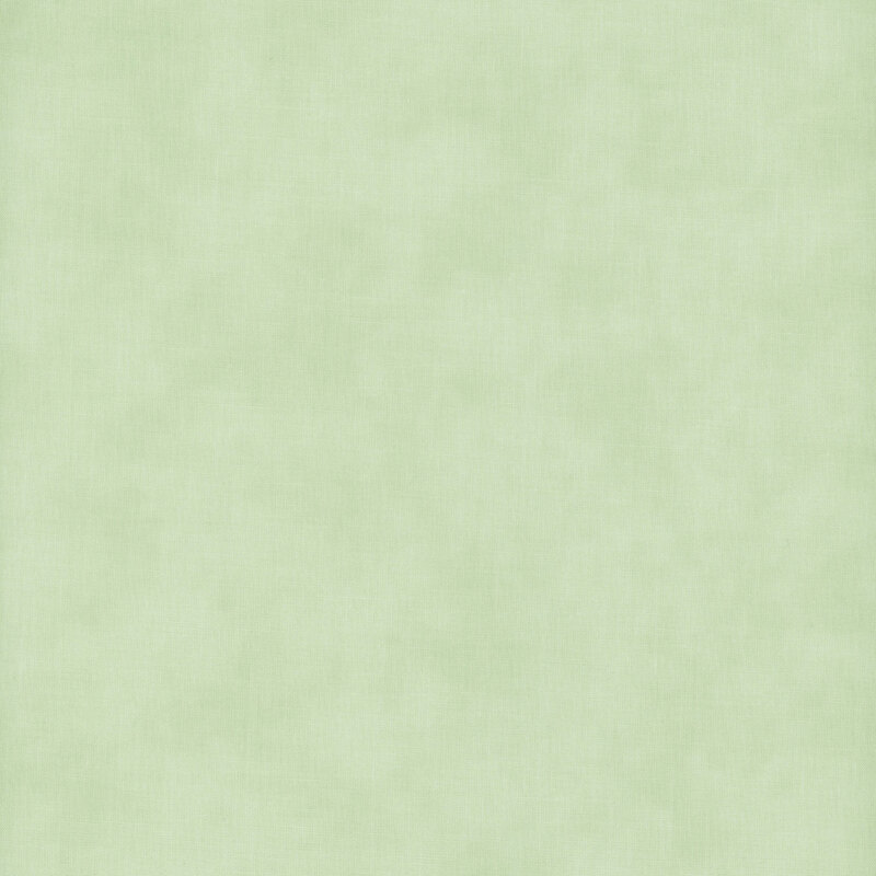Mottled linen textured fabric in soft mint green