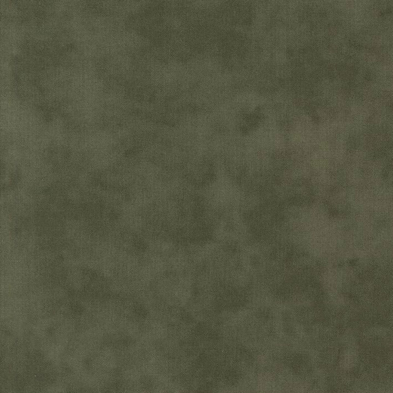 Mottled linen textured fabric in dark pine green