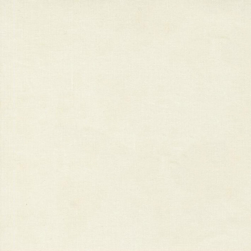 Mottled linen textured fabric in light cream