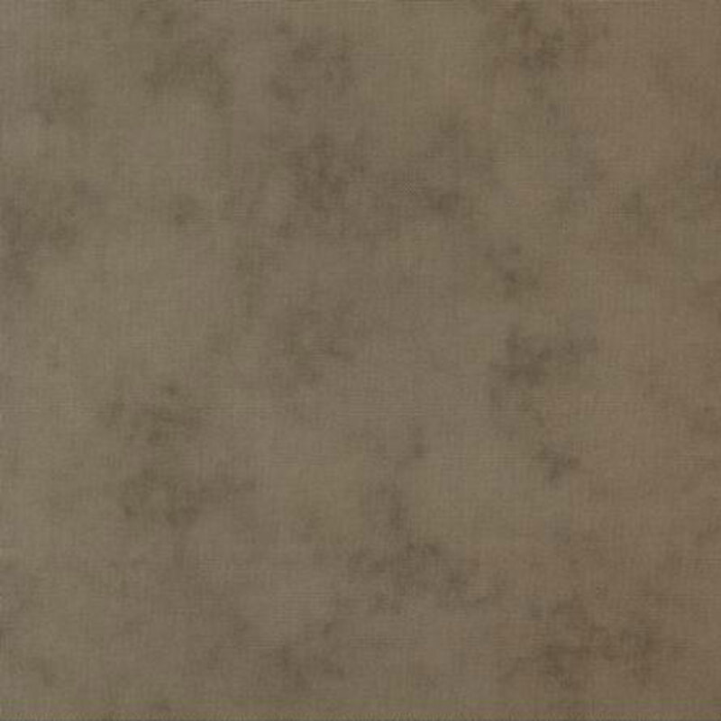 Mottled linen textured fabric in muted brown