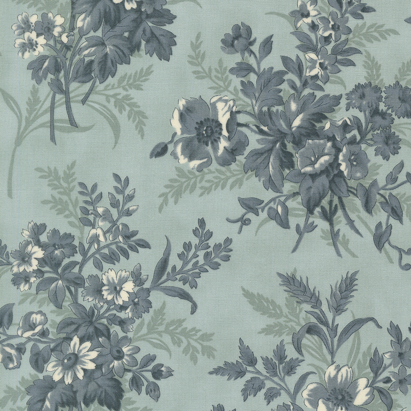 A light blue fabric with large muted blue floral clusters. 