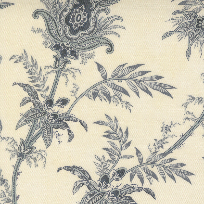 A cream fabric with large muted blue Jacobean style florals. 