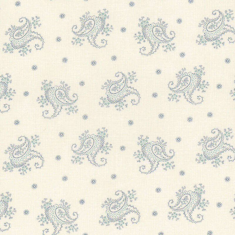 A cream fabric with tossed blue modified paisleys and dotted flowers.