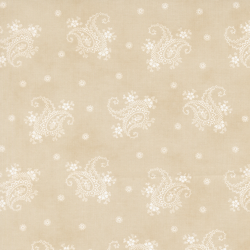 A cream fabric with tossed white modified paisleys and dotted flowers.