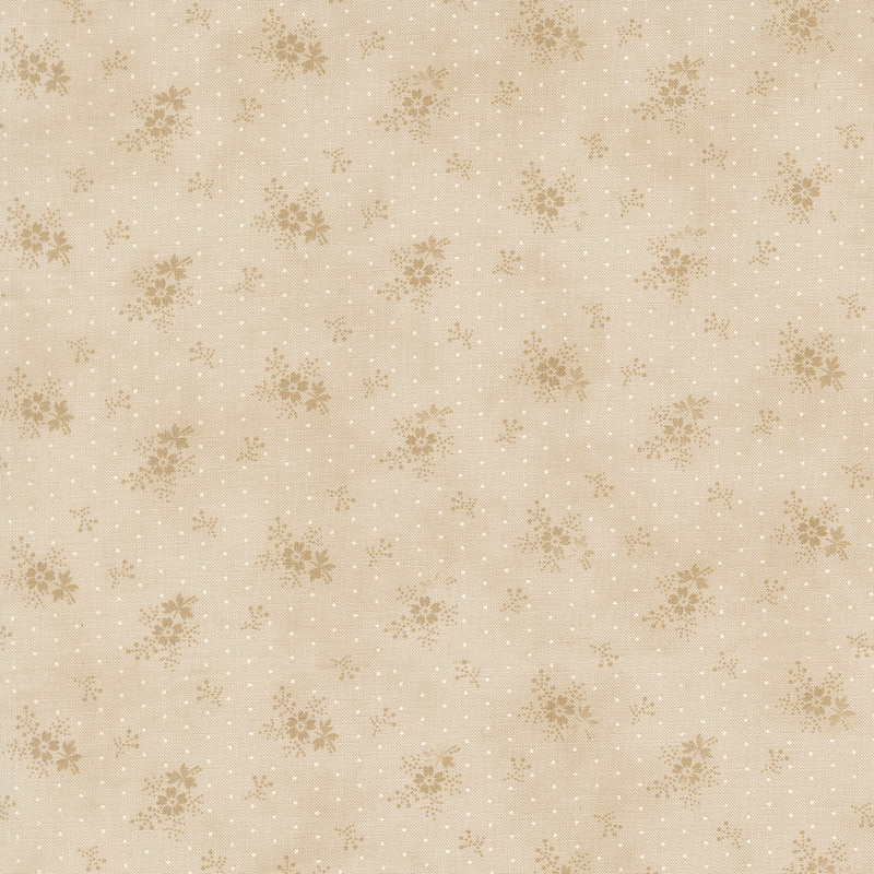 A tonal cream polka dot fabric with tossed sprigs and florets.