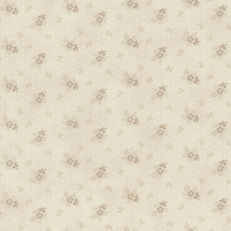 A tonal cream polka dot fabric with tossed sprigs and florets.