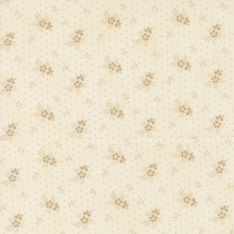A tonal cream polka dot fabric with tossed sprigs and florets.