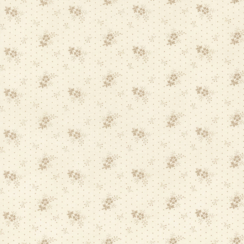 A tonal cream polka dot fabric with tossed sprigs and florets.
