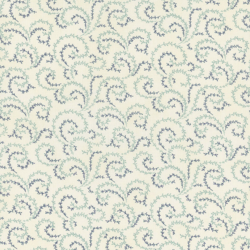 A cream fabric with sea foam green and navy blue organic swirls.