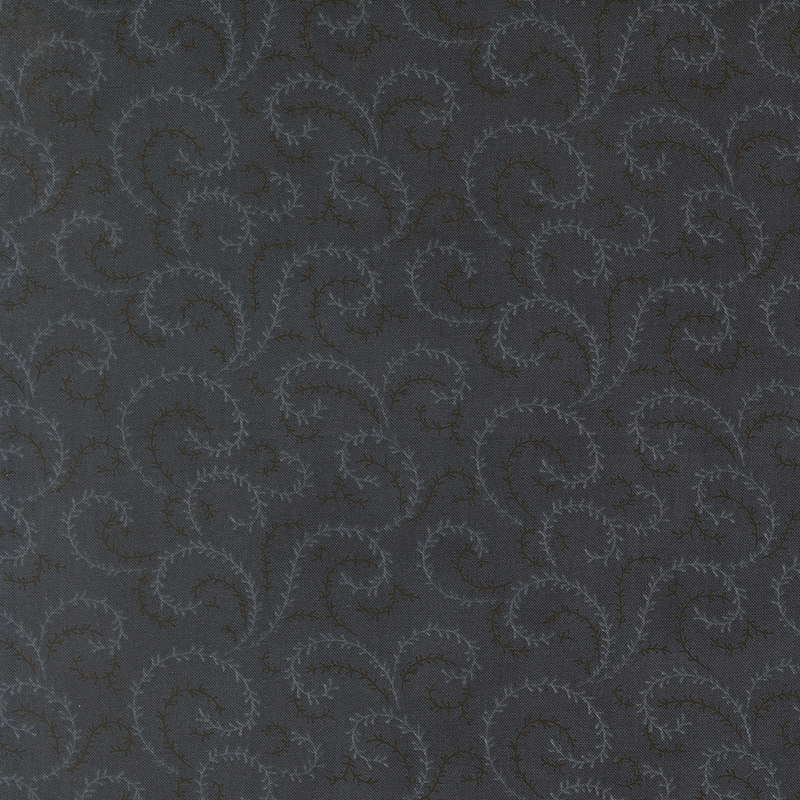 A black fabric with gray and black organic swirls.