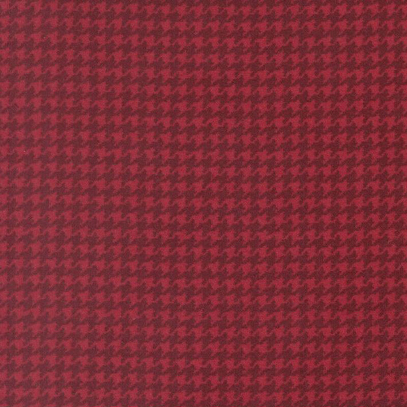 Crimson fabric with a small, dark red houndstooth pattern