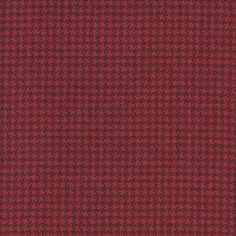 Crimson fabric with a small, dark red houndstooth pattern
