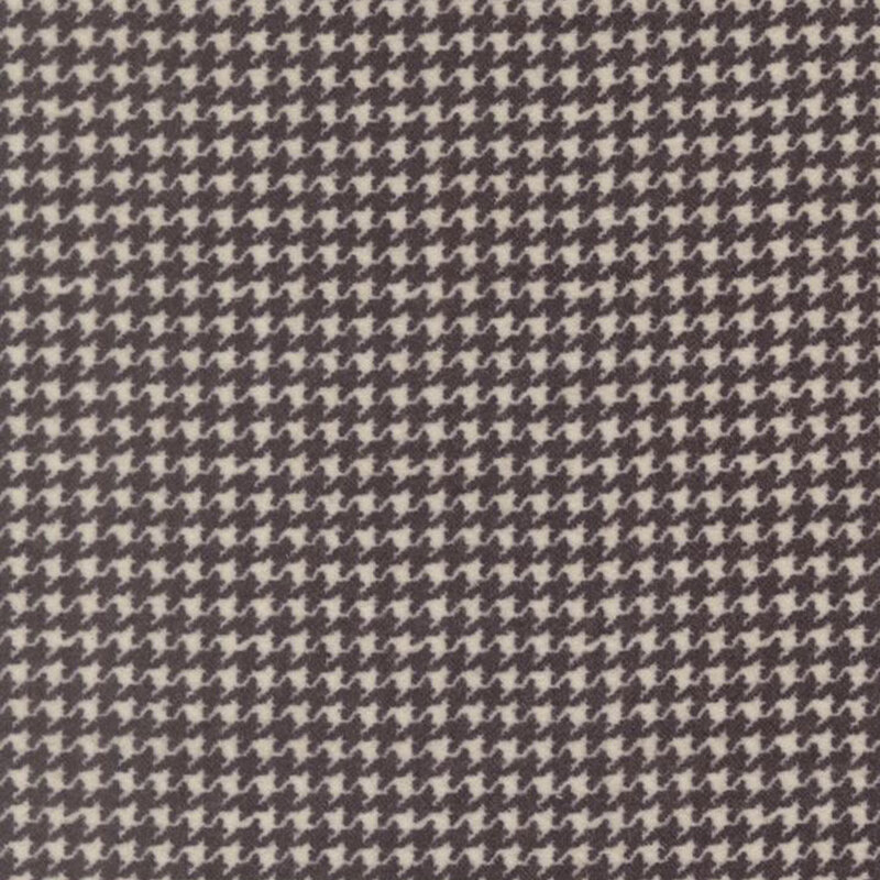 Cream fabric with a small soft black houndstooth pattern