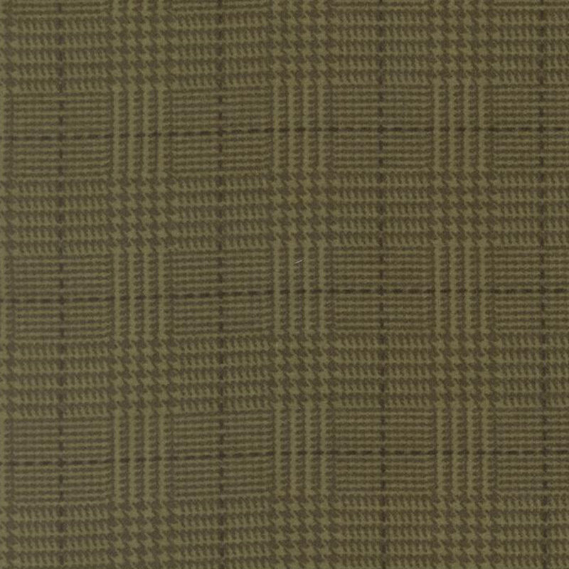 Olive fabric with a tonal green plaid pattern 