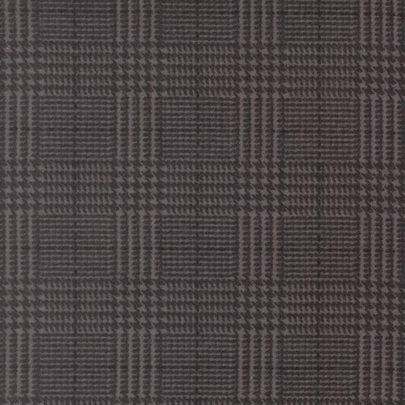 Charcoal fabric with a tonal black plaid pattern 