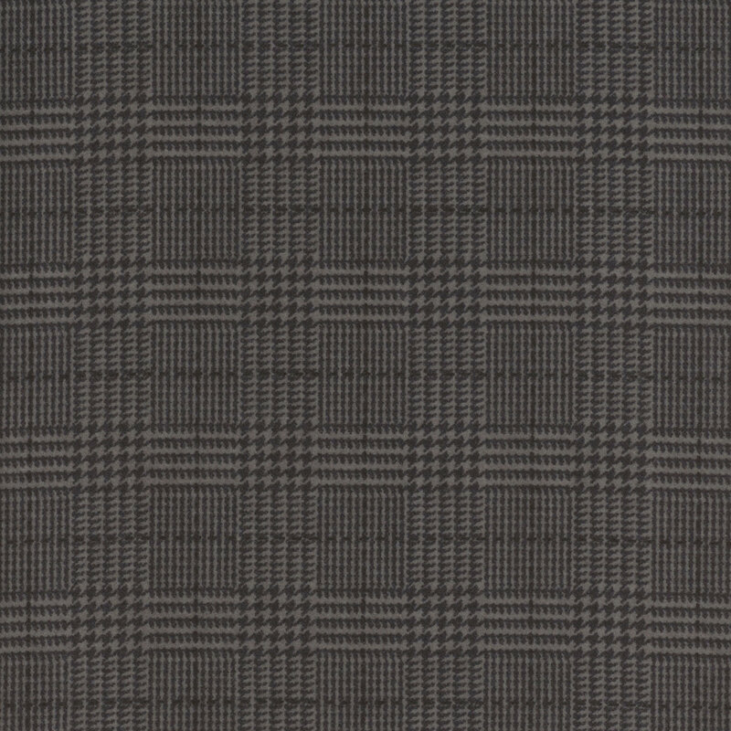 Charcoal fabric with a tonal black plaid pattern 