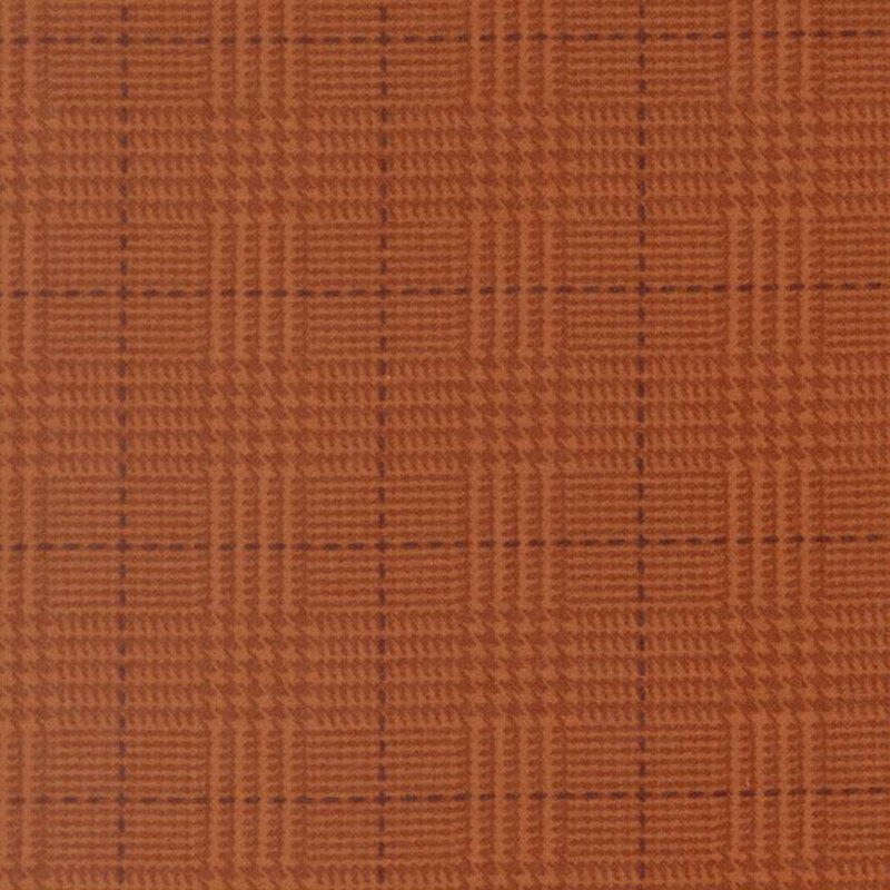 Pumpkin fabric with a tonal orange plaid pattern 