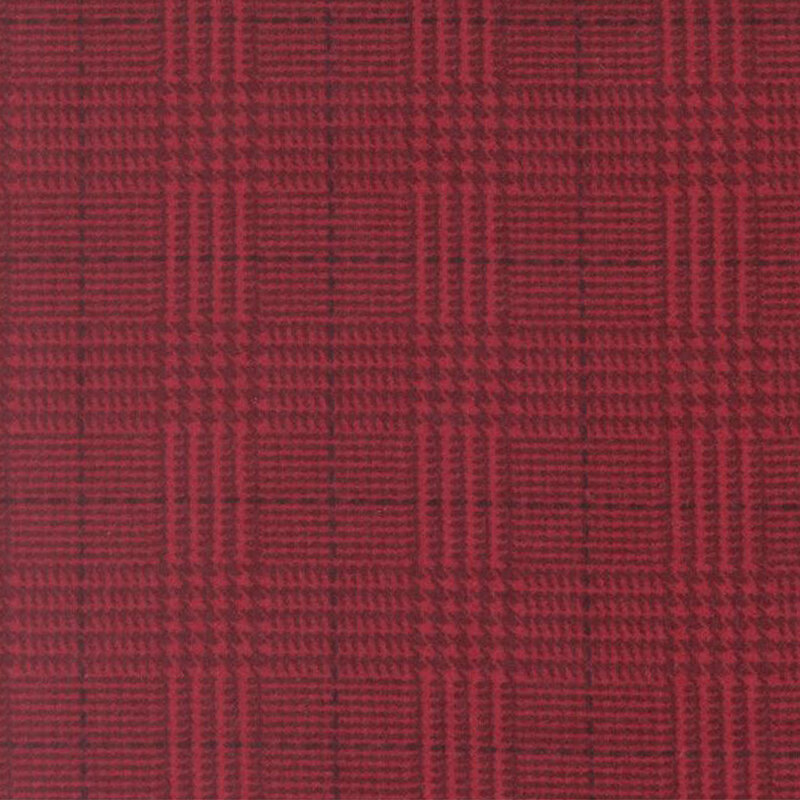 Crimson fabric with a tonal dark red plaid pattern 