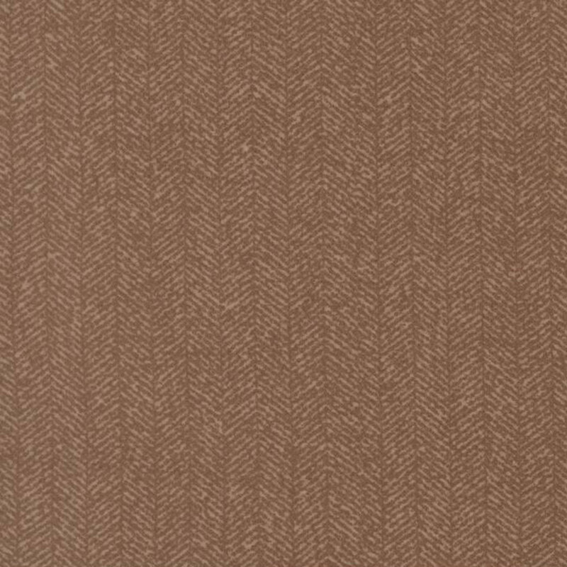 Nut brown fabric with a dense chevron pattern and flecks of tan