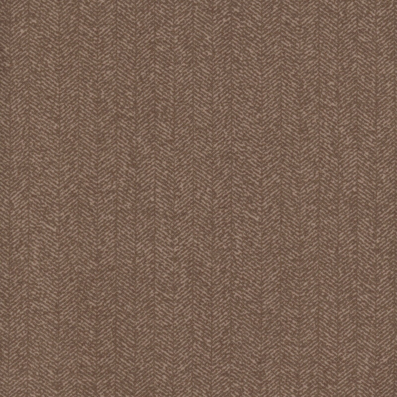 Nut brown fabric with a dense chevron pattern and flecks of tan