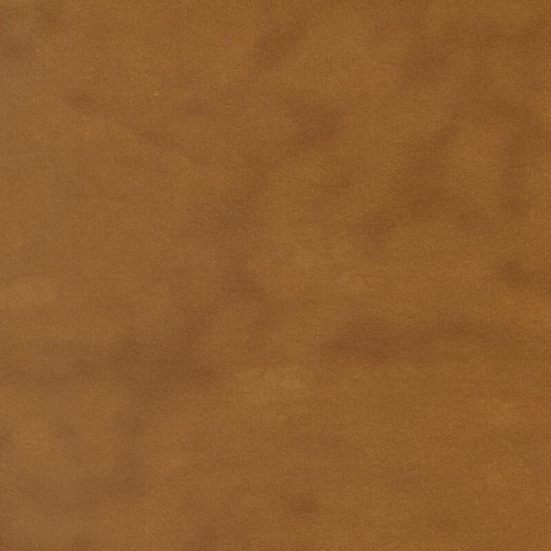 Dark mustard colored flannel fabric with subtle mottling