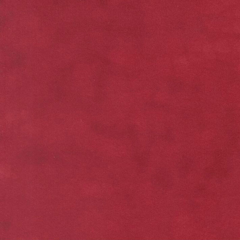 Crimson red colored flannel fabric with subtle mottling