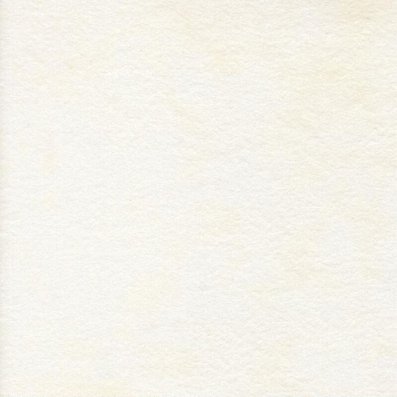 Cream colored flannel fabric with subtle mottling