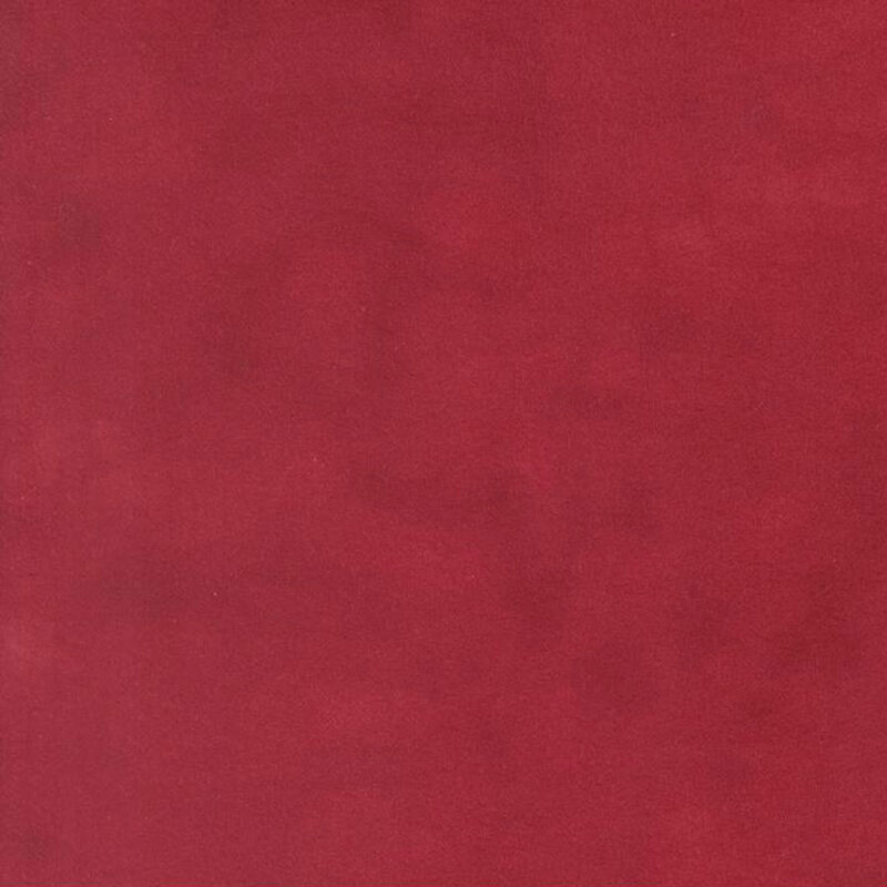 Crimson red colored flannel fabric with subtle mottling